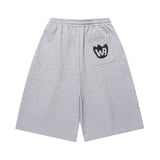 WIDE SWEAT BERMUDA SHORTS